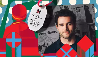 A promotional graphic featuring Jordan Robertson beside a Kiehl's collaboration tag, set against a colorful, patterned background.​
