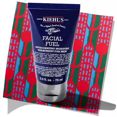 Tube of Kiehl's Facial Fuel Energizing Moisture Treatment for Men set against a patterned holiday background.